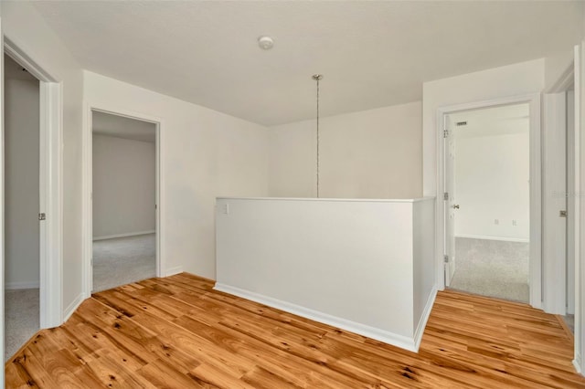 1734 Mapleleaf Blvd, Oldsmar, FL 34677 - spare room with light wood-style floors and a smoke detector