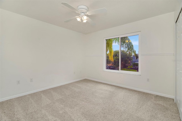1734 Mapleleaf Blvd, Oldsmar, FL 34677 - carpeted spare room with baseboards and ceiling fan
