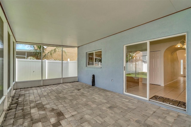 1734 Mapleleaf Blvd, Oldsmar, FL 34677 - unfurnished sunroom with arched walkways