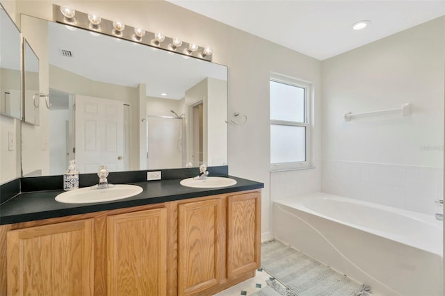 1734 Mapleleaf Blvd, Oldsmar, FL 34677 - full bath featuring a garden tub, a stall shower, and double vanity