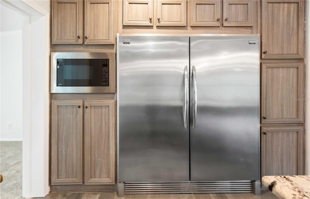 6728 Sutton Oaks Ln, Zephyrhills, FL 33541 - kitchen with appliances with stainless steel finishes and baseboards