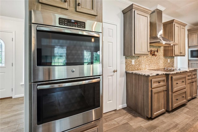 6728 Sutton Oaks Ln, Zephyrhills, FL 33541 - kitchen featuring stainless steel double oven, wall chimney exhaust hood, crown molding, backsplash, and light stone countertops