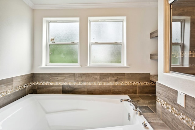 6728 Sutton Oaks Ln, Zephyrhills, FL 33541 - bathroom featuring a garden tub and crown molding