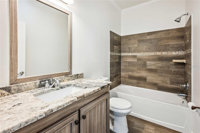 6728 Sutton Oaks Ln, Zephyrhills, FL 33541 - bathroom featuring ornamental molding, vanity, washtub / shower combination, and wood finished floors