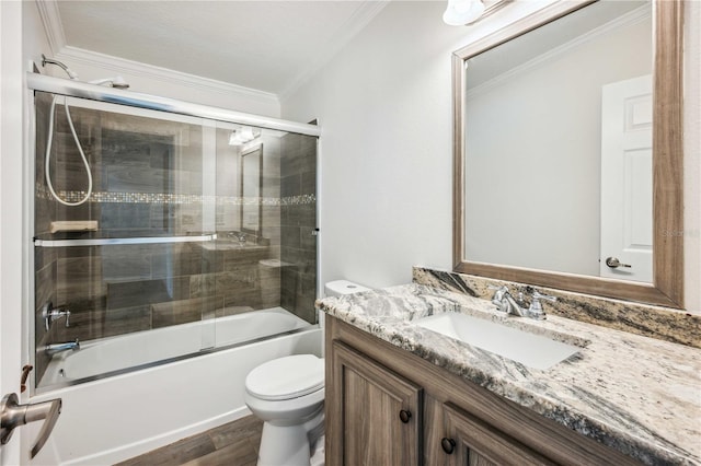 6728 Sutton Oaks Ln, Zephyrhills, FL 33541 - full bath with ornamental molding, vanity, wood finished floors, and shower / bath combination with glass door