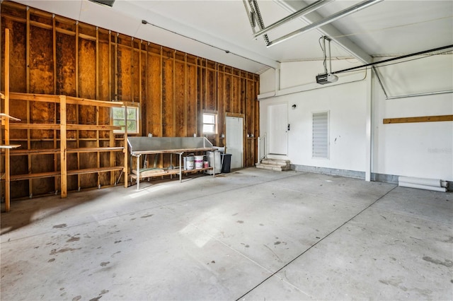 6728 Sutton Oaks Ln, Zephyrhills, FL 33541 - garage with a garage door opener