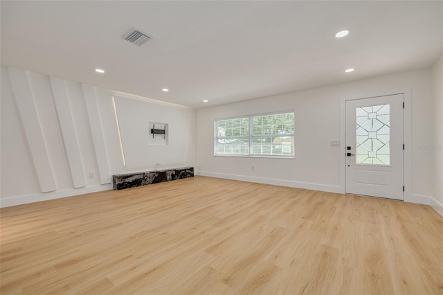 1723 Cypress Ave, Belleair, FL 33756 - entryway featuring light wood-style flooring and recessed lighting