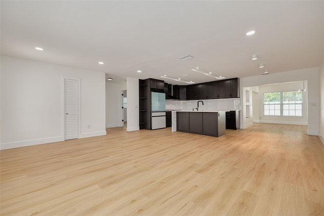 1723 Cypress Ave, Belleair, FL 33756 - unfurnished living room featuring recessed lighting and light wood-type flooring
