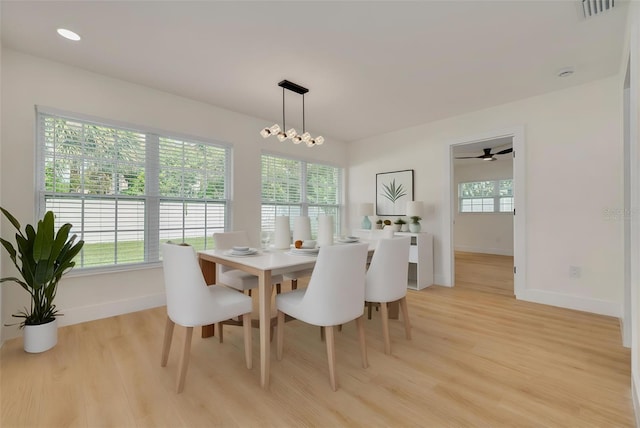 1723 Cypress Ave, Belleair, FL 33756 - dining space with light wood-style floors