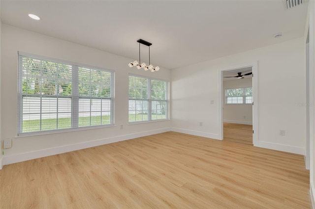 1723 Cypress Ave, Belleair, FL 33756 - unfurnished room with light wood-style flooring, a smoke detector, and recessed lighting