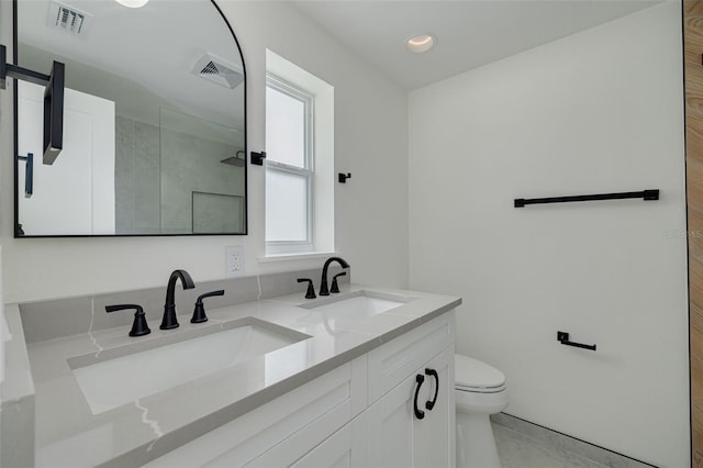 1723 Cypress Ave, Belleair, FL 33756 - full bathroom with double vanity, recessed lighting, and a tile shower