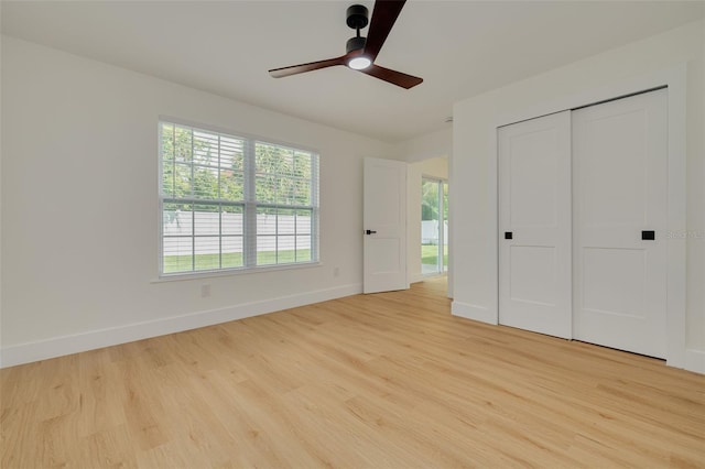 1723 Cypress Ave, Belleair, FL 33756 - unfurnished bedroom with light wood-style flooring, a closet, and ceiling fan