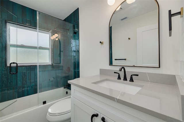 1723 Cypress Ave, Belleair, FL 33756 - bathroom with vanity and shower / bath combination with glass door