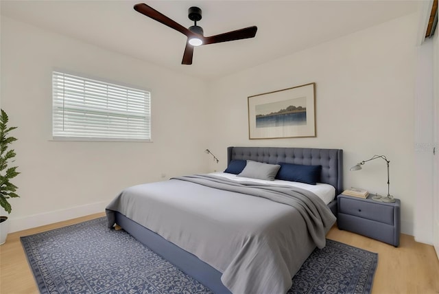 1723 Cypress Ave, Belleair, FL 33756 - bedroom with light wood finished floors and a ceiling fan