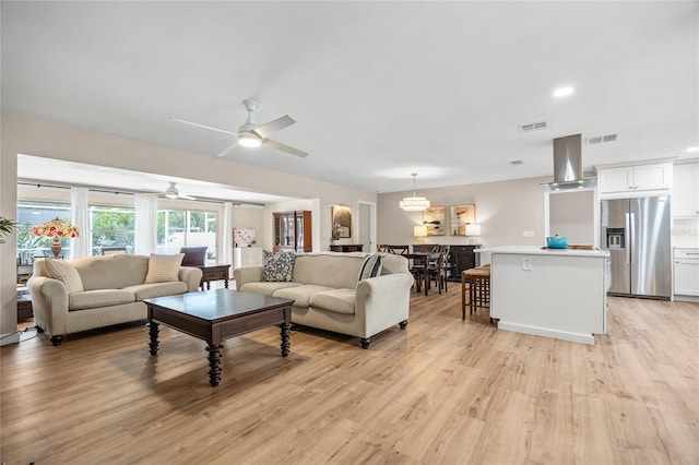 1251 Fairway Dr, Dunedin, FL 34698 - living area with ceiling fan, light wood-style floors, and recessed lighting