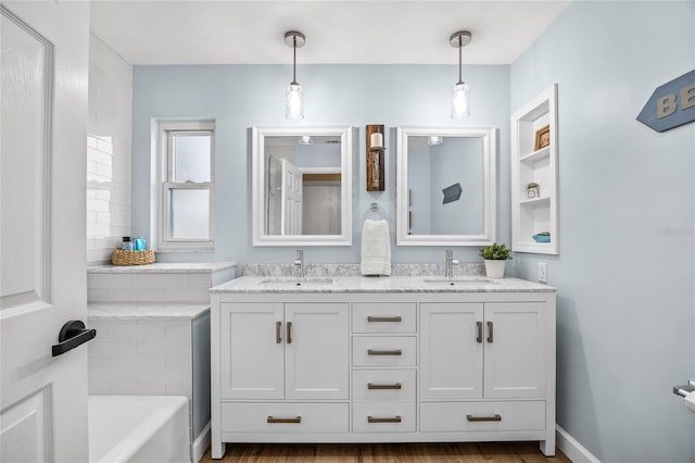 1251 Fairway Dr, Dunedin, FL 34698 - bathroom with double vanity and a tub