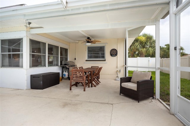 1251 Fairway Dr, Dunedin, FL 34698 - sunroom featuring a ceiling fan, plenty of natural light, and outdoor dining space