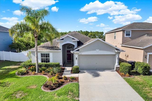 11309 Langworth Hill Ln, Riverview, FL 33579 - view of front of home featuring stucco siding, an attached garage, concrete driveway, and roof with shingles