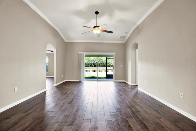 11309 Langworth Hill Ln, Riverview, FL 33579 - unfurnished room featuring a ceiling fan, dark wood-style floors, arched walkways, crown molding, and vaulted ceiling