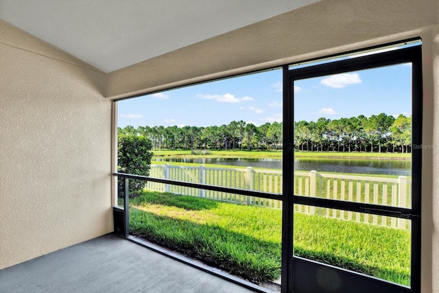 11309 Langworth Hill Ln, Riverview, FL 33579 - unfurnished sunroom with a water view, view of wooded area, healthy amount of natural light, and lofted ceiling