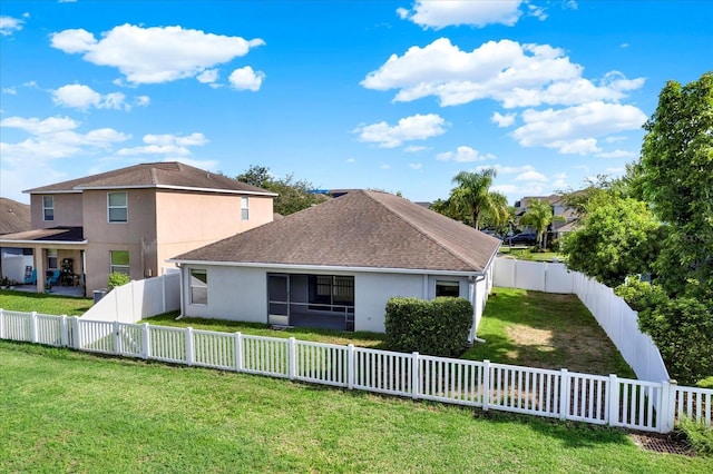 11309 Langworth Hill Ln, Riverview, FL 33579 - back of property with stucco siding, a fenced backyard, and roof with shingles
