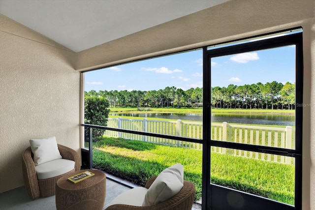 11309 Langworth Hill Ln, Riverview, FL 33579 - sunroom / solarium featuring a water view, view of scattered trees, and lofted ceiling