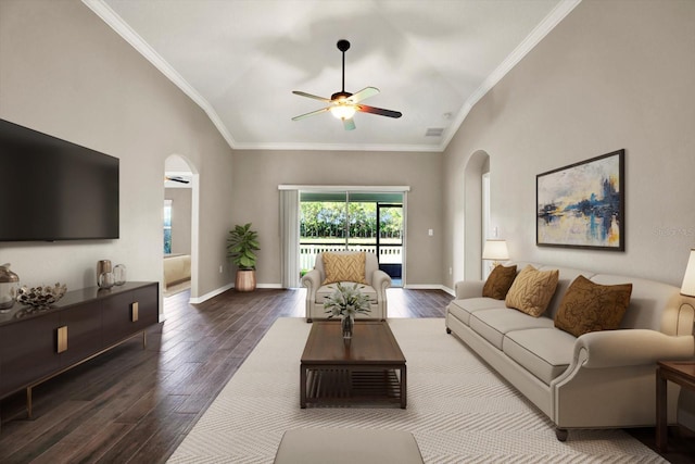 11309 Langworth Hill Ln, Riverview, FL 33579 - living room featuring ceiling fan, vaulted ceiling, wood finished floors, crown molding, and arched walkways