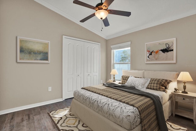 11309 Langworth Hill Ln, Riverview, FL 33579 - bedroom featuring lofted ceiling, dark wood-type flooring, a closet, ornamental molding, and ceiling fan