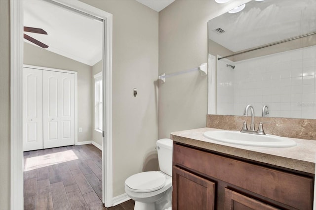 11309 Langworth Hill Ln, Riverview, FL 33579 - full bathroom with vaulted ceiling, vanity, wood finished floors, a ceiling fan, and a shower