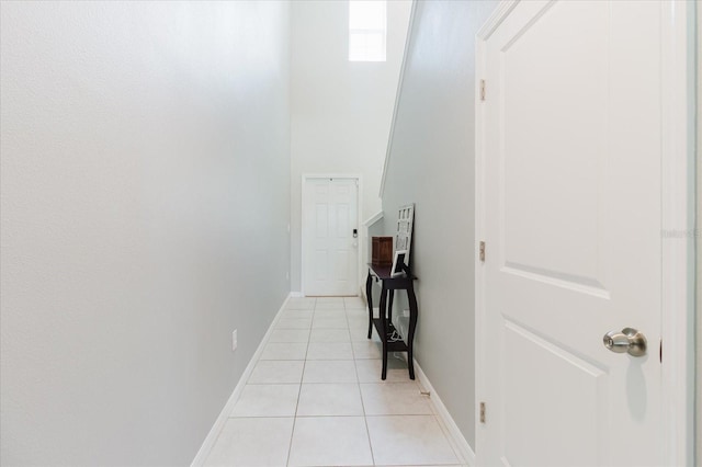 17156 Yellow Pine St, Wimauma, FL 33598 - hall with light tile patterned floors and baseboards