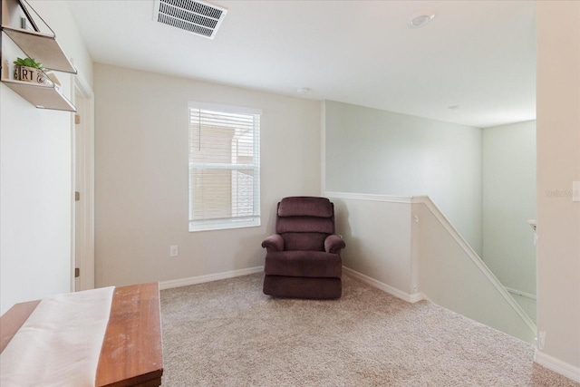 17156 Yellow Pine St, Wimauma, FL 33598 - sitting room featuring an upstairs landing and carpet
