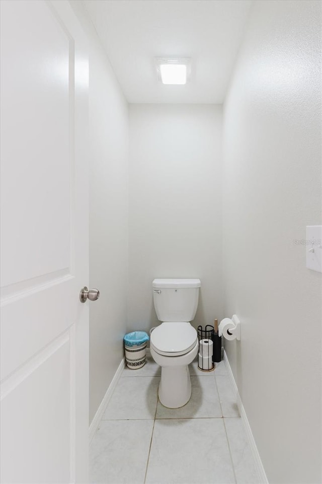 17156 Yellow Pine St, Wimauma, FL 33598 - bathroom featuring toilet and tile patterned floors