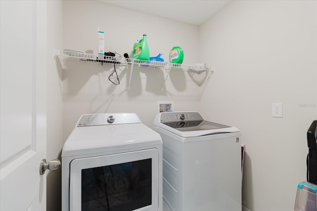 17156 Yellow Pine St, Wimauma, FL 33598 - laundry room featuring washer and dryer