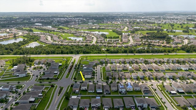 17156 Yellow Pine St, Wimauma, FL 33598 - aerial view of property and surrounding area with a nearby body of water and nearby suburban area