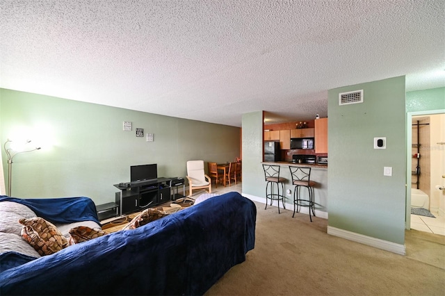 4015 My Lady Ln Unit 7, Land O Lakes, FL 34638 - living room with light carpet and a textured ceiling
