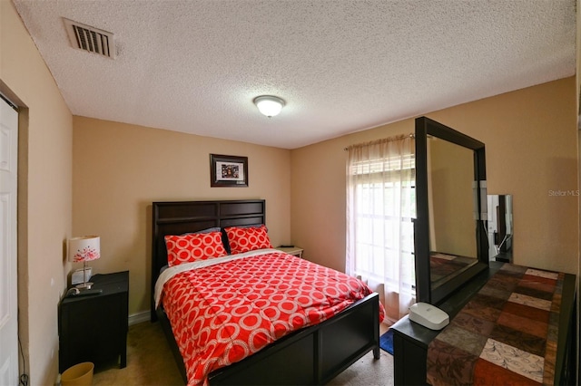 4015 My Lady Ln Unit 7, Land O Lakes, FL 34638 - bedroom featuring a textured ceiling and carpet flooring