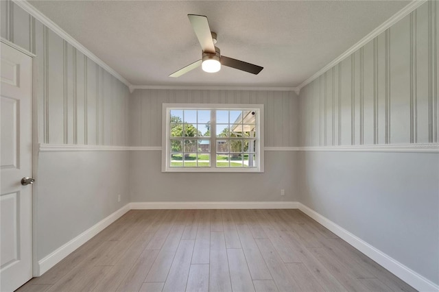 4518 Helena St NE, Saint Petersburg, FL 33703 - empty room featuring crown molding, wood finished floors, and ceiling fan