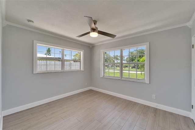 4518 Helena St NE, Saint Petersburg, FL 33703 - unfurnished room featuring crown molding, light wood finished floors, ceiling fan, a textured ceiling, and a smoke detector