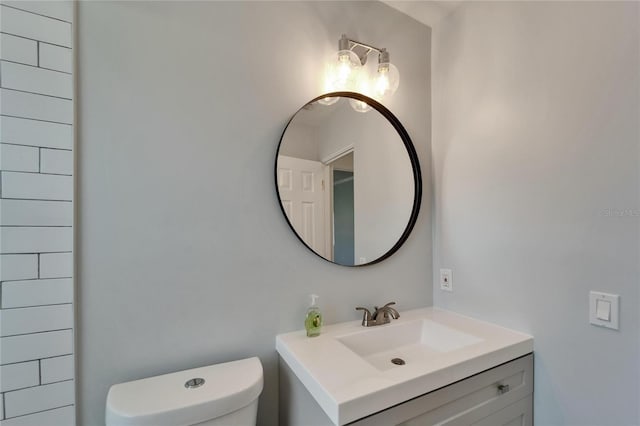 4518 Helena St NE, Saint Petersburg, FL 33703 - bathroom featuring toilet and vanity