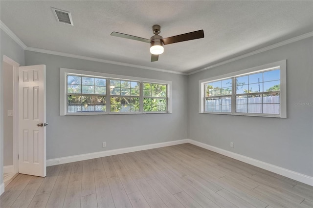 4518 Helena St NE, Saint Petersburg, FL 33703 - unfurnished room with ceiling fan, light wood-type flooring, and ornamental molding