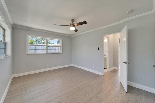 4518 Helena St NE, Saint Petersburg, FL 33703 - spare room with a smoke detector, light wood-type flooring, a ceiling fan, and ornamental molding