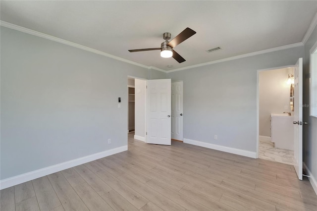 4518 Helena St NE, Saint Petersburg, FL 33703 - unfurnished bedroom featuring ornamental molding, light wood-style floors, and a ceiling fan