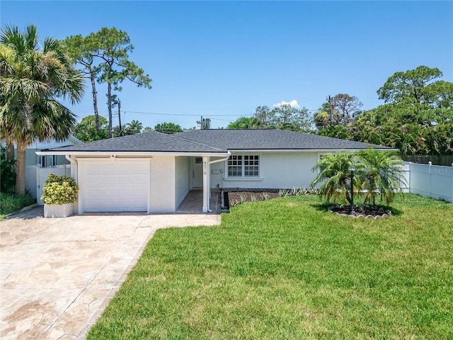 4518 Helena St NE, Saint Petersburg, FL 33703 - single story home featuring a garage, stucco siding, and driveway