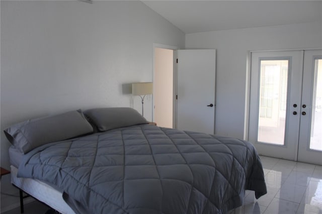 5581 Greyston St, Palm Harbor, FL 34685 - bedroom featuring vaulted ceiling and french doors
