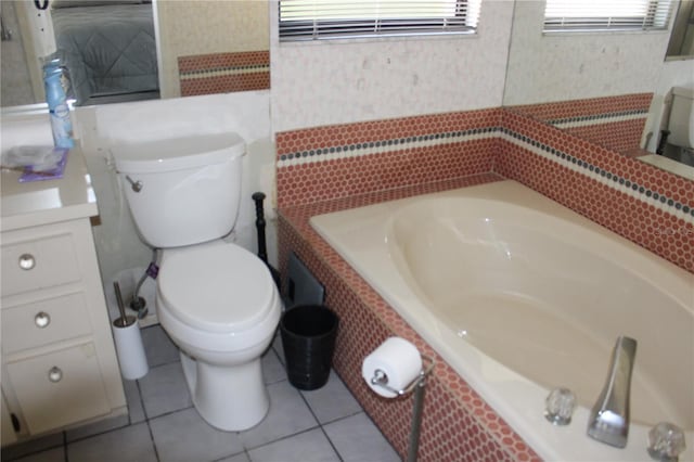 5581 Greyston St, Palm Harbor, FL 34685 - full bathroom featuring a garden tub, vanity, and tile patterned floors