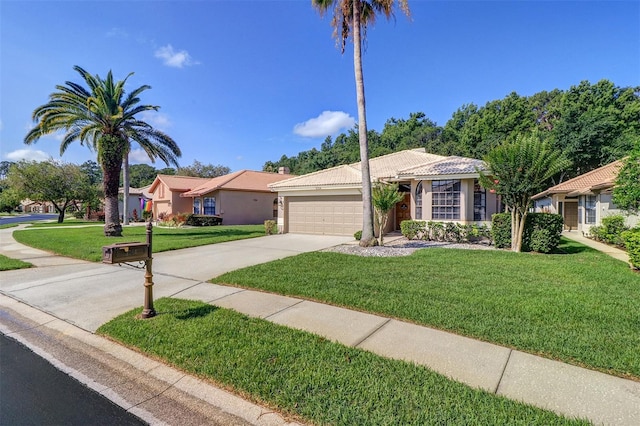 3704 Darston St, Palm Harbor, FL 34685 - ranch-style house with driveway, an attached garage, a front yard, and stucco siding