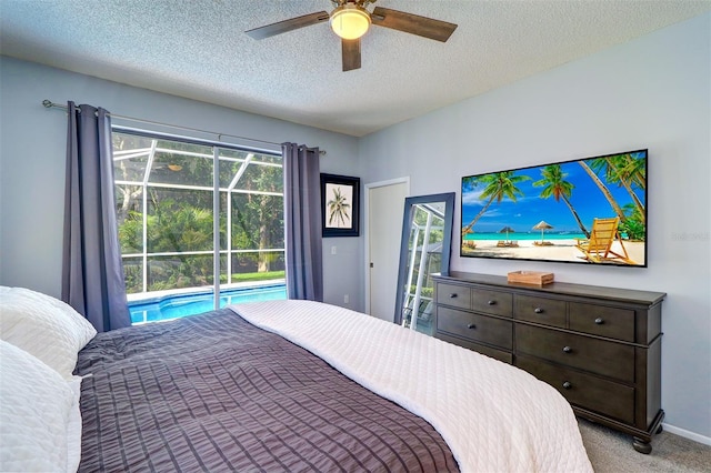 3704 Darston St, Palm Harbor, FL 34685 - bedroom with access to outside, a textured ceiling, carpet floors, and a ceiling fan