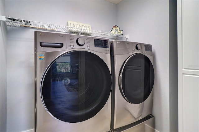 3704 Darston St, Palm Harbor, FL 34685 - laundry room featuring washer and dryer