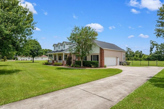 10510 Lithia Estates Dr, Lithia, FL 33547 - view of front of home with concrete driveway, an attached garage, and a porch