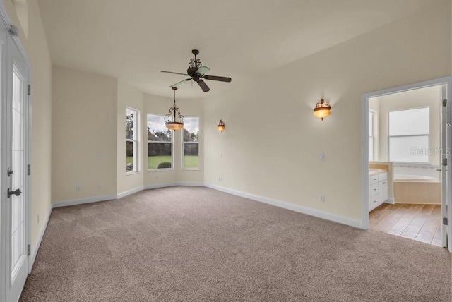 10510 Lithia Estates Dr, Lithia, FL 33547 - spare room featuring light carpet and ceiling fan